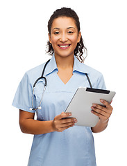 Image showing doctor or nurse with stethoscope and tablet pc