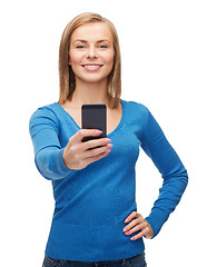 Image showing woman taking self picture with smartphone camera