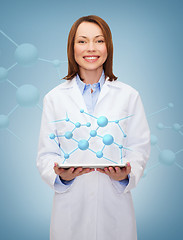 Image showing smiling female doctor and tablet pc computer