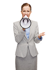 Image showing angry businesswoman with megaphone