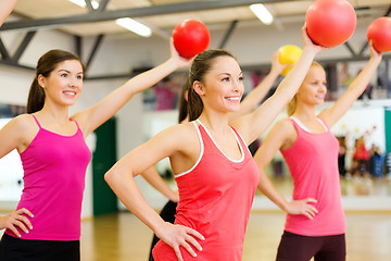 Image showing group of people working out with stability balls