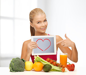 Image showing woman with fruits, vegetables and tablet pc