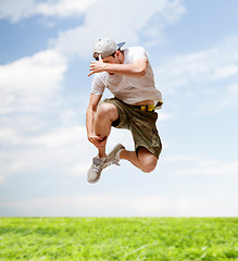 Image showing male dancer jumping in the air