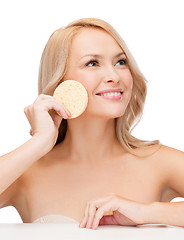 Image showing beautiful woman with sponge