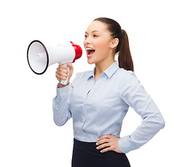 Image showing screaming businesswoman with megaphone