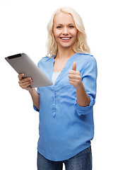 Image showing girl with tablet pc computer showing thumbs up