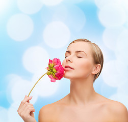 Image showing lovely woman with peonie flower