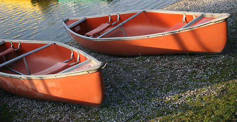 Image showing canoes in the morning light