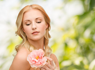 Image showing lovely woman with peony flower