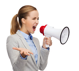 Image showing angry businesswoman with megaphone