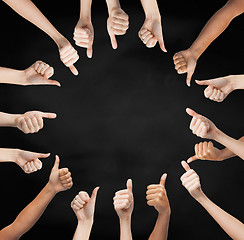 Image showing human hands showing thumbs up in circle