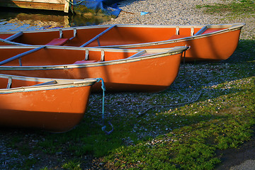 Image showing canoes in the morning light