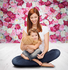 Image showing happy mother with adorable girl and teddy bear