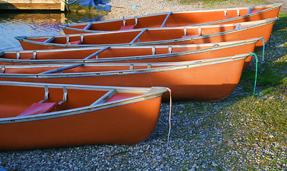 Image showing canoes in the morning light