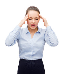 Image showing upset businesswoman having headache