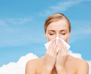 Image showing beautiful woman with paper tissue