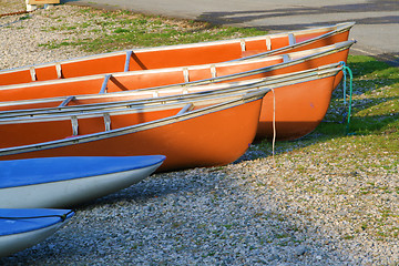 Image showing canoes in the morning light