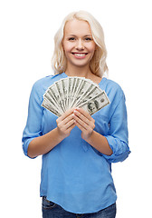 Image showing smiling girl with dollar cash money