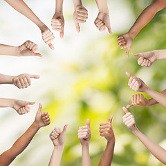 Image showing human hands showing thumbs up in circle