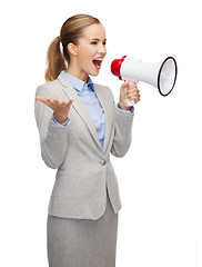 Image showing smiling businesswoman with megaphone