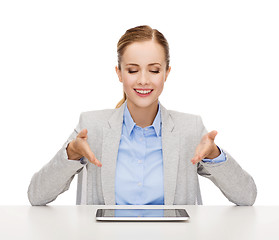 Image showing smiling businesswoman with tablet pc