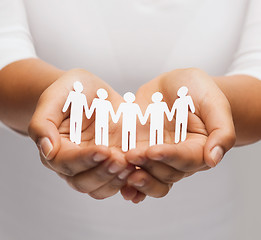 Image showing womans hands with paper team