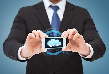 Image showing businessman showing smartphone with blank screen