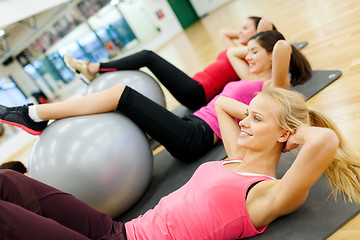 Image showing group of people working out in pilates class