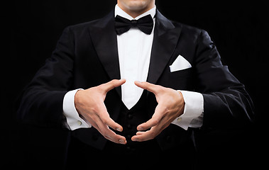 Image showing magician showing trick