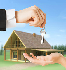 Image showing close up of man and woman with house keys