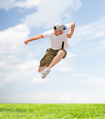 Image showing male dancer jumping in the air