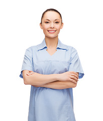 Image showing smiling female doctor or nurse