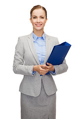 Image showing smiling businesswoman with folder