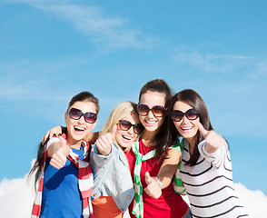 Image showing teenage girls or young women showing thumbs up