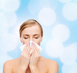 Image showing beautiful woman with paper tissue