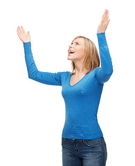 Image showing laughing young woman waving hands
