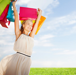 Image showing woman with shopping bags