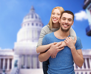 Image showing smiling couple hugging