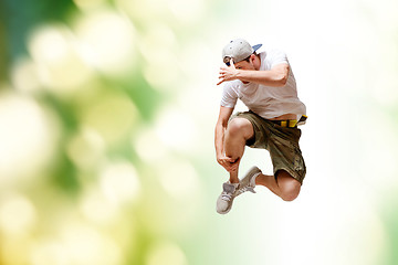 Image showing male dancer jumping in the air