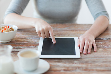 Image showing woman pointing finger to tablet pc computer