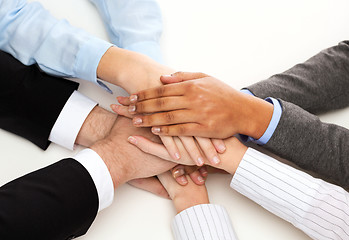 Image showing group of businesspeople celebrating victory