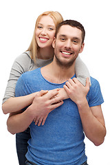 Image showing smiling couple hugging