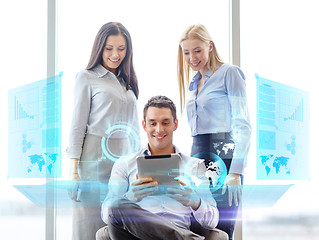 Image showing business team working with tablet pc in office