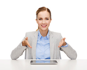 Image showing smiling businesswoman with tablet pc