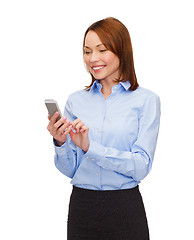 Image showing young smiling businesswoman with smartphone