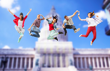 Image showing group of teenagers jumping