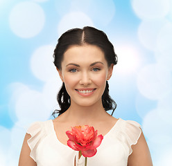 Image showing young and beautiful woman with flower