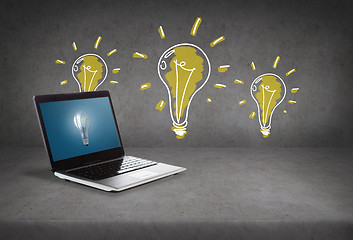Image showing laptop computer with light bulb on screen