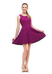 Image showing young woman in purple dress and high heels