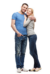 Image showing smiling couple hugging